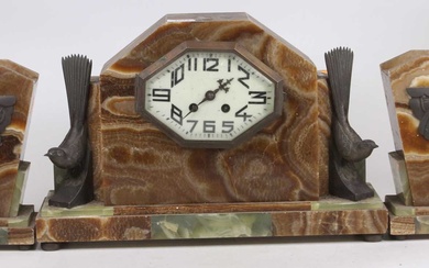 Lot details An Art Deco marble and onyx three-piece clock...