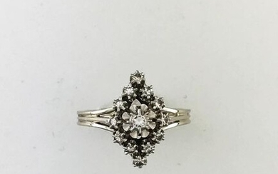 Marquise ring in white gold 750°/°°° and platinum set with a diamond in a diamond ring, Circa 1950, Finger size 55, Gross weight: 3,91g