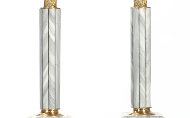 Pair of marble pedestals with brass decorations. (2)