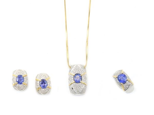 Parure of white and yellow gold ring, earrings and necklace with diamonds and tanzanites