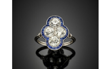 Platinum ring with four old mine diamonds in all ct. 2.25 circa finished with calibré sapphires, g 4.20 circa size...