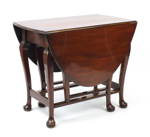 Queen Anne style walnut drop leaf table with pad feet