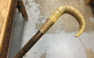 Segmented walking cane with gold plated collar and horn handle