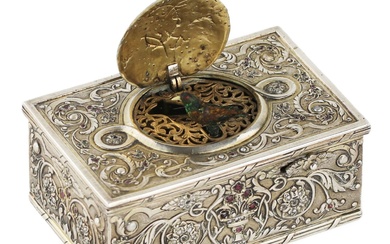 Silver music box with gilding and stones with a singing...