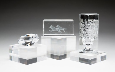 THREE CLEAR CRYSTAL PAPERWEIGHTS.