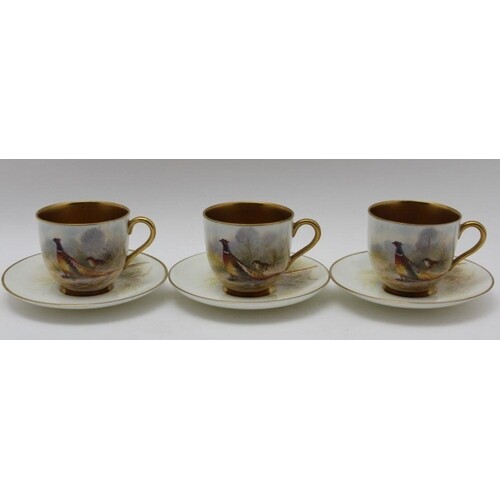THREE ROYAL WORCESTER PORCELAIN COFFEE CUPS & SAUCERS, each ...