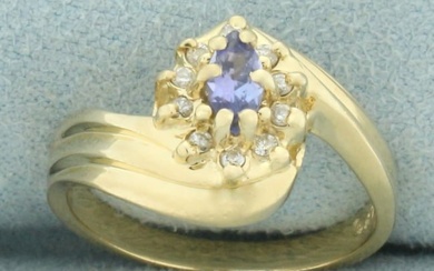 Tanzanite and Diamond Flower Bypass Ring in 14k Yellow Gold