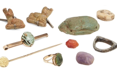 Three miscellaneous antiquities Various Periods Including an Egyptian Middle Kingdom amethyst scarab, 19mm long; a Neo-Assyrian cream stone scaraboid, inscribed with a deity in profile, circa 7th Century B.C., and an Egyptian Late Period green...
