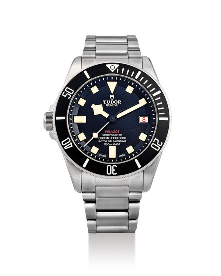 Tudor. A Titanium Left Handed Wristwatch with Bracelet, Date and Helium Escape Valve