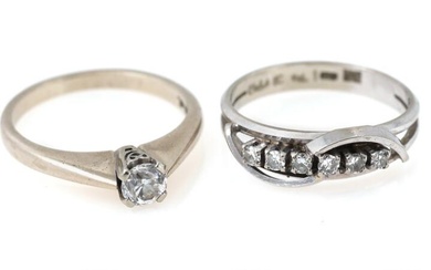 Two diamond rings respectively set with an old-cut and six single-cut diamonds,...