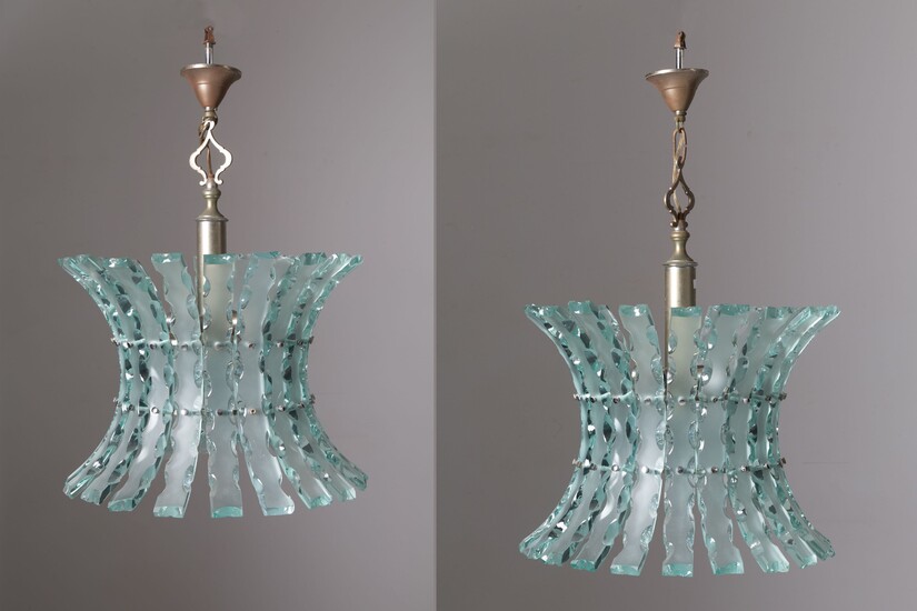 Two metal and glass chandeliers. ZEROQUATTRO. 60s