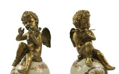 Vintage bronze angels on porcelain ball