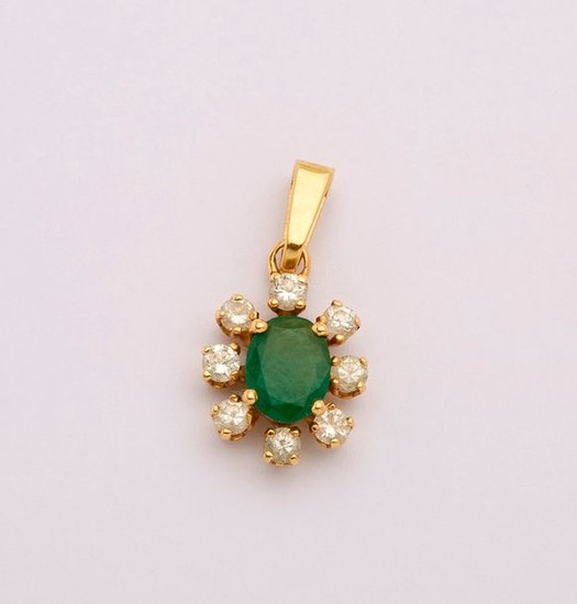 Yellow gold pendant decorated in the centre with...