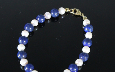 bracelet with SWZP and lapis lazuli, 375 yellow gold.