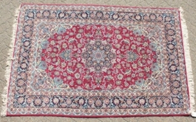 A FINE PERSIAN SILK AND WOOL ISFAHAN CARPET
