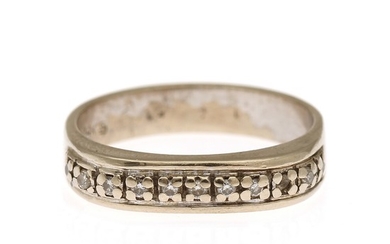 A diamond ring set with seven brilliant-cut diamonds, mounted in 14k white gold. Size 56.