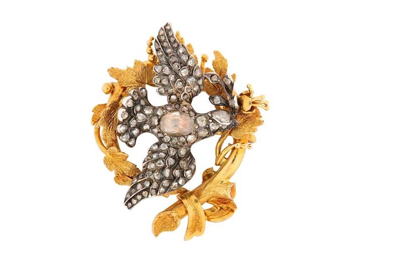 A diamond-set bird brooch, circa 1900 The realistically designed...