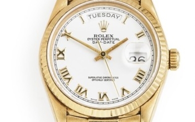 Rolex: A gentleman's wristwatch of 18k gold. Model Day-Date, ref. 18038. Mechanical COSC movement with automatic winding, day and date, cal. 3055. 1985.