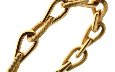 18 carat gold bracelet, of alternating textured and plain...