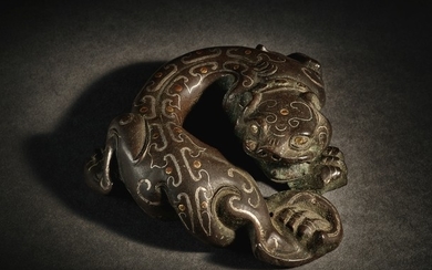 A RARE GOLD AND SILVER-INLAID BRONZE MYTHICAL BEAST WESTERN HAN DYNASTY