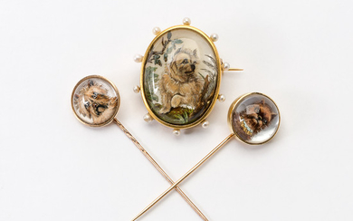 An antique 18 carat gold intaglio brooch/medallion and two antique 14 carat gold intaglio tie pins