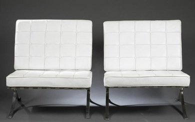 2 Barcelona style, white leather chairs.