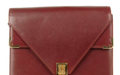 CARTIER - a Bordeaux double flap handbag. View more details