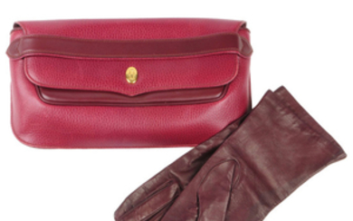 CARTIER - a Bordeaux leather clutch and a pair of leather gloves.