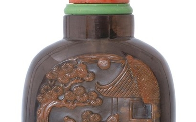 DARK TEA CRYSTAL SNUFF BOTTLE In flattened ovoid form, with russet skin area carved with a scene of a scholar being served tea while...