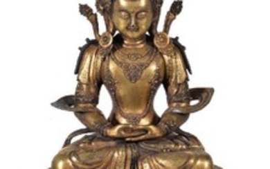 A large Sino-Tibetan gilt-bronze figure of Amitayus