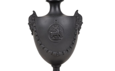 A Neale & Co. black basalt urn with mask handles