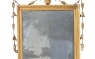 A rectangular wall mirror in George III style