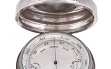 A silver cased aneroid pocket barometer with altimeter