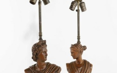 A pair of wood bust form table lamps