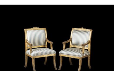 A pair of 18th-century giltwood armchairs (defects)