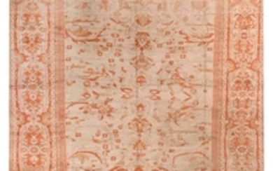 ORIENTAL RUG: MAHAL 12'0" x 15'0" Bold orange and tan serrated leaves and stylized blossoms on ivory branches neatly arrayed along t.