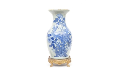 A 19TH CENTURY CHINESE QING PERIOD CELADON AND BLUE PORCELAIN AND ORMOLU VASE