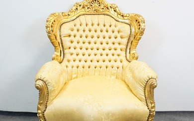 A 20th century Louis XIV style armchair.