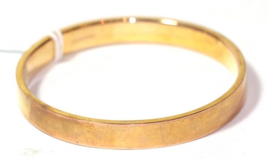 A 9 carat gold bangle, internal diameter 7.1cm