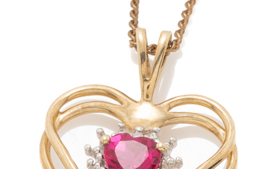 A 9CT GOLD HEART PENDANT; centing a heart shape synthetic...