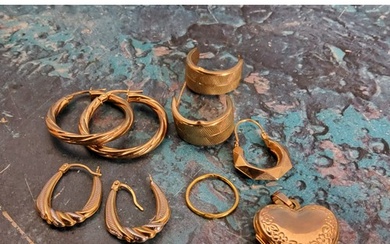 A 9ct gold heart shaped locket, 1.85g; a 9ct gold hoop earri...