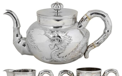A BOXED CHINESE SILVER THREE-PIECE TEA SET AND SUGAR...