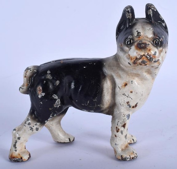 A CAST IRON FIGURE OF A STANDING DOG. 13 cm x 12 cm.