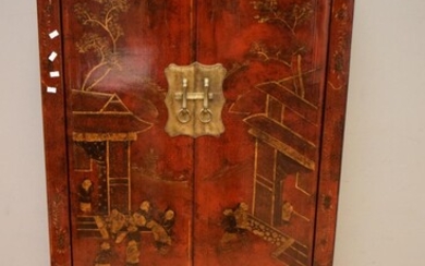 A CHINESE DECORATIVE RED LACQUERED TWO DOOR CABINET (170H X 80W X 44D CM)