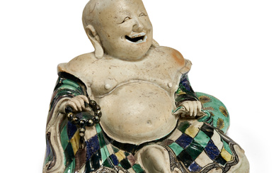 A CHINESE EXPORT PORCELAIN BISCUIT-GLAZED FIGURE OF A LAUGHING BUDDHA...
