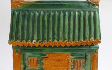 A CHINESE FUNERARY POTTERY MODEL OF A HOUSE, MING DYNASTY.