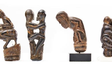 A COLLECTION OF FOUR INDONESIAN FIGURAL CARVED HORN HANDLES CIRCA 19TH CENTURY