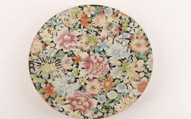 A Chinese Fencai porcelain plate with flower pattern
