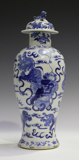 A Chinese blue and white porcelain vase and cover, mark of Kangxi but late 19th century, of baluster