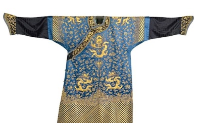 A Chinese blue-ground embroidered dragon robe, 19th century